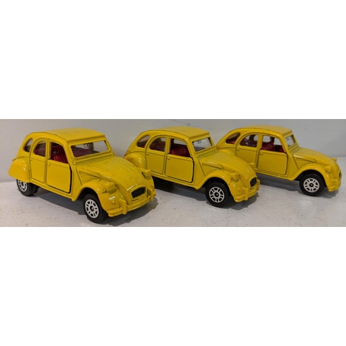 218 - Corgi to include Tom & Jerry vehicles, a Pink Panther on a bike and three yellow Citroen 2CVs from t... 