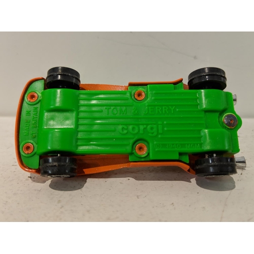 218 - Corgi to include Tom & Jerry vehicles, a Pink Panther on a bike and three yellow Citroen 2CVs from t... 