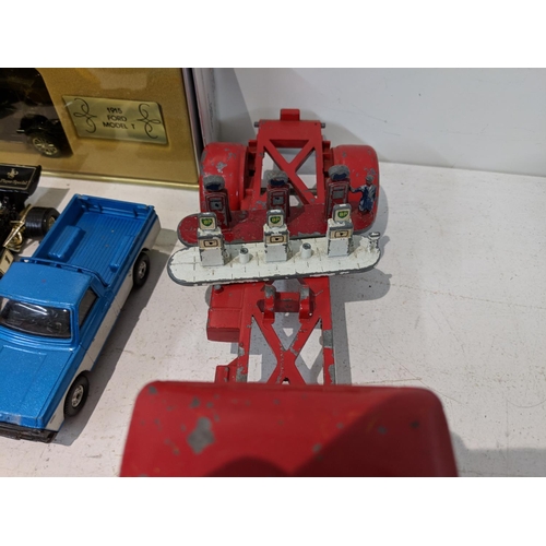 218 - Corgi to include Tom & Jerry vehicles, a Pink Panther on a bike and three yellow Citroen 2CVs from t... 