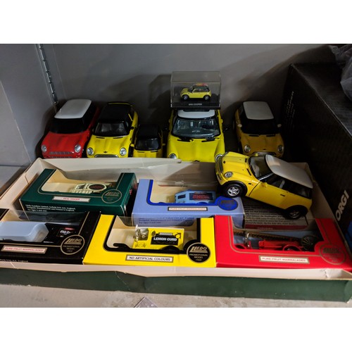 220 - A collection of model Mini Coopers, a Corgi BMW New Mini Cooper Diorama and 3 model set, CHivers mod... 