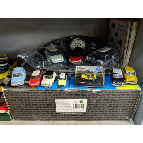 220 - A collection of model Mini Coopers, a Corgi BMW New Mini Cooper Diorama and 3 model set, CHivers mod... 