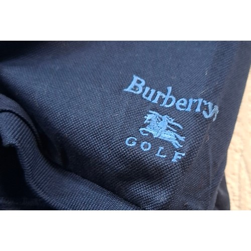 6 - Burberrys- A gents navy collared t-shirt, size Large. Location:Rail BWR
Condition:No signs of wear.