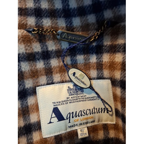 22 - Aquascutum- A gents navy wool mix duffle coat having 3 horn toggle buttons, a hood, tartan fleece li... 