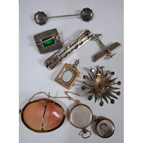 40 - A small Victorian leather jewellery box and contents to include early 20th Century silver and white ... 