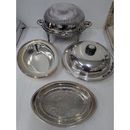 441 - Silver plated items to include a roll-top serving dish having a ribbed dome revolving lid on curved ... 