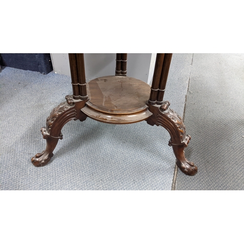 470 - A Georgian inspired early 20th century mahogany occasional table having a shaped top, turned columns... 