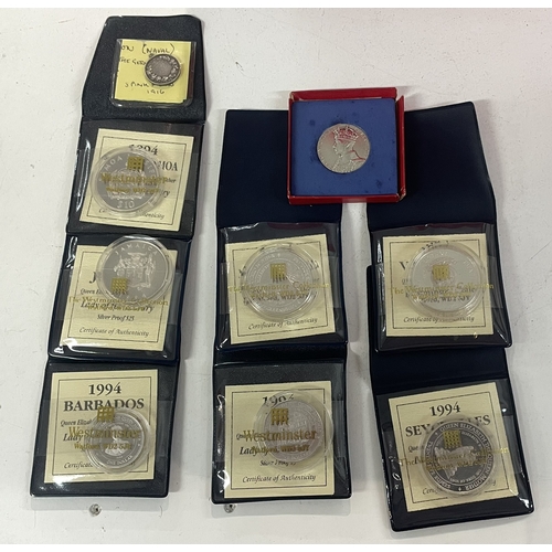 16 - A collection of seven silver 