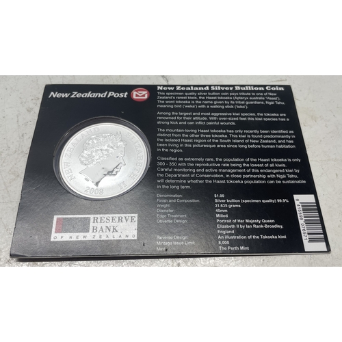 20 - A collection of five New Zealand $1 silver coins in presentation packs and a 1998 New Zealand $10 wi... 