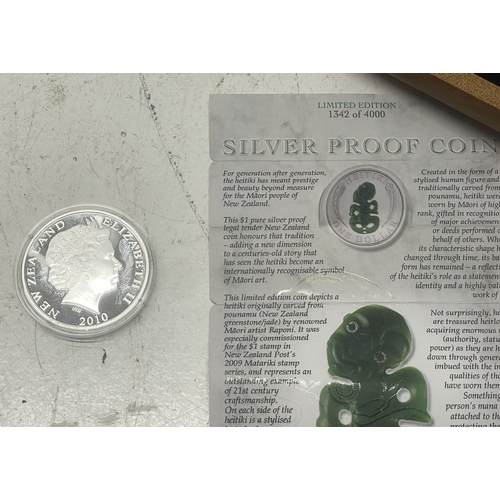 31 - A collection of commemorative New Zealand Silver coinage to include Olympics Moscow 2008 7 coin set,... 