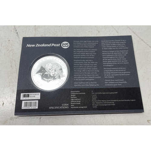 33 - A collection of seven New Zealand $1 silver coins in presentation packs, combined weight of coins 20... 