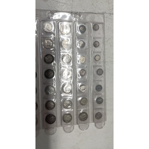 53 - A collection of  UK coins to include one penny,  1/2 penny, two penny and three penny to includes co... 