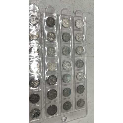 54 - A collection of  UK coins to include 3 penny, 4 penny and sixpences, total weight 136.2g.
Location: ... 