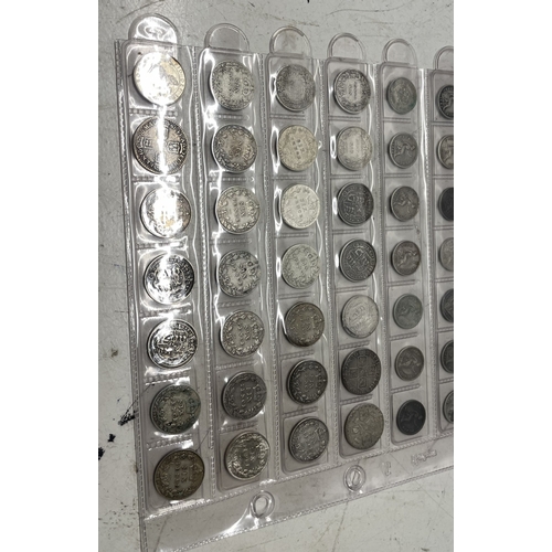 54 - A collection of  UK coins to include 3 penny, 4 penny and sixpences, total weight 136.2g.
Location: ... 