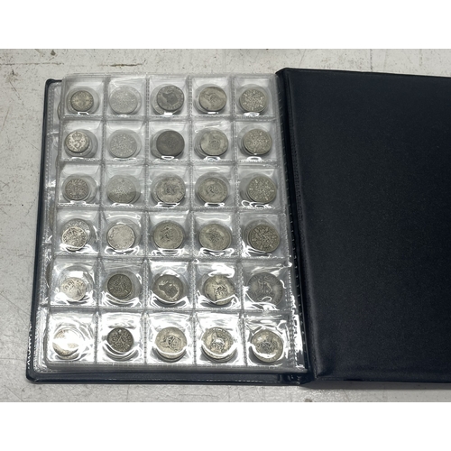 6 - Folder containing various silver coinage from Victoria to George V to include Florins, Shillings and... 
