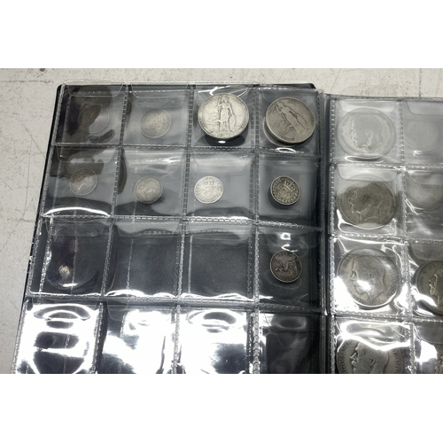 6 - Folder containing various silver coinage from Victoria to George V to include Florins, Shillings and... 