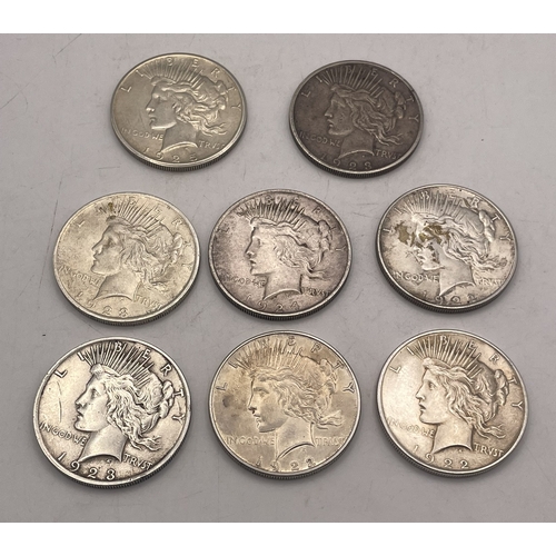 69 - United States - eight Liberty one dollar coins, also known as the peace dollar, total weight 213.5g.... 