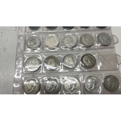 A collection of UK one florin coins - eighteen pre 1920 and six pre ...