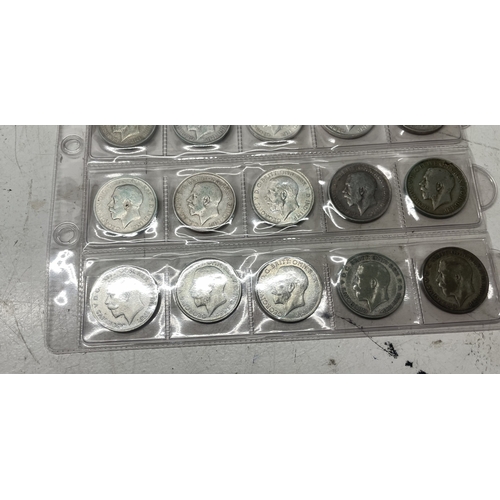 A collection of UK one florin coins - eighteen pre 1920 and six pre ...