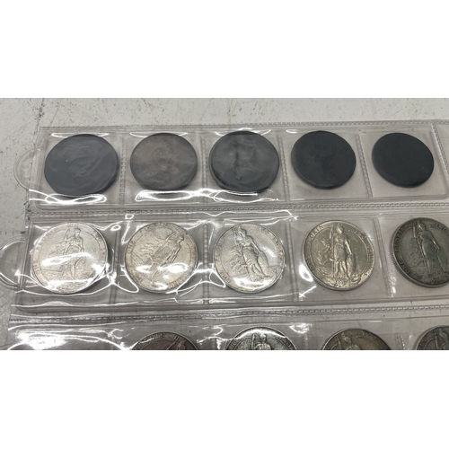 A collection of UK one florin coins - eighteen pre 1920 and six pre ...