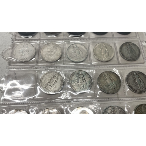 A collection of UK one florin coins - eighteen pre 1920 and six pre ...