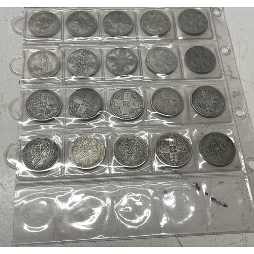 A collection of UK one florin coins, eleven pre 1920 and fourteen pre ...