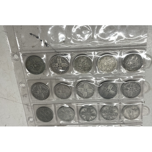 A collection of UK one florin coins, eleven pre 1920 and fourteen pre ...