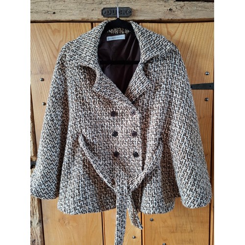 17 - Elizabeth Emanual- A late 20th Century wool mix belted cape having a chevron design UK10 together wi... 