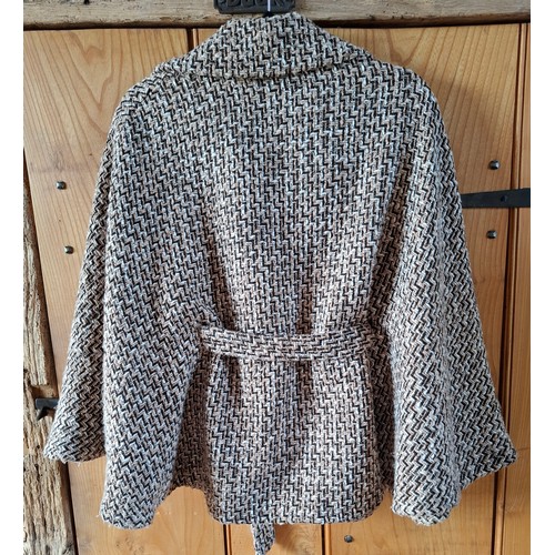 17 - Elizabeth Emanual- A late 20th Century wool mix belted cape having a chevron design UK10 together wi... 