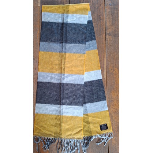 17 - Elizabeth Emanual- A late 20th Century wool mix belted cape having a chevron design UK10 together wi... 