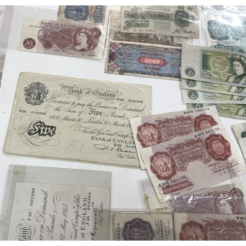 13A - A large collection of mainly British bank notes to include 10 Shilling notes, £1 Pound notes and £5 ... 