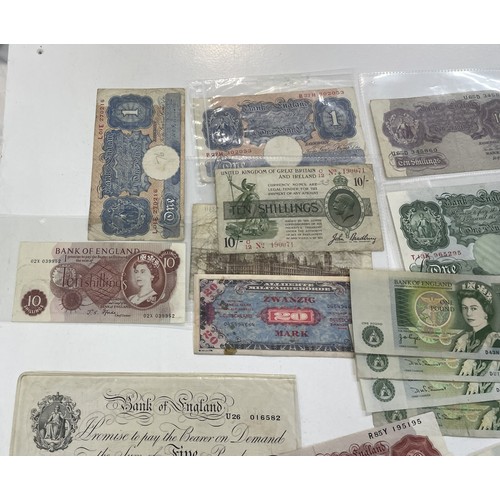 13A - A large collection of mainly British bank notes to include 10 Shilling notes, £1 Pound notes and £5 ... 