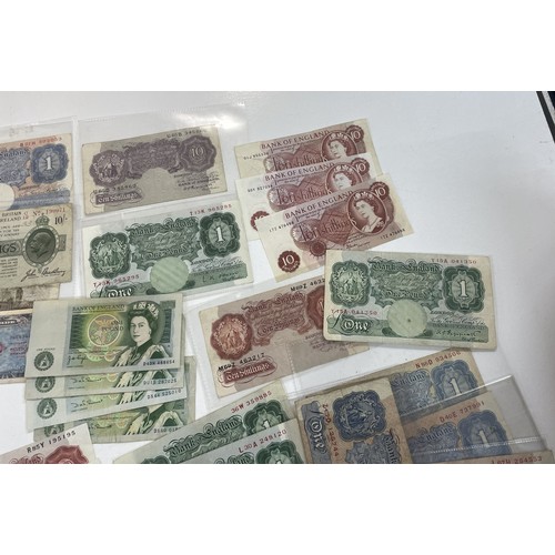 13A - A large collection of mainly British bank notes to include 10 Shilling notes, £1 Pound notes and £5 ... 
