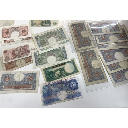 13A - A large collection of mainly British bank notes to include 10 Shilling notes, £1 Pound notes and £5 ... 