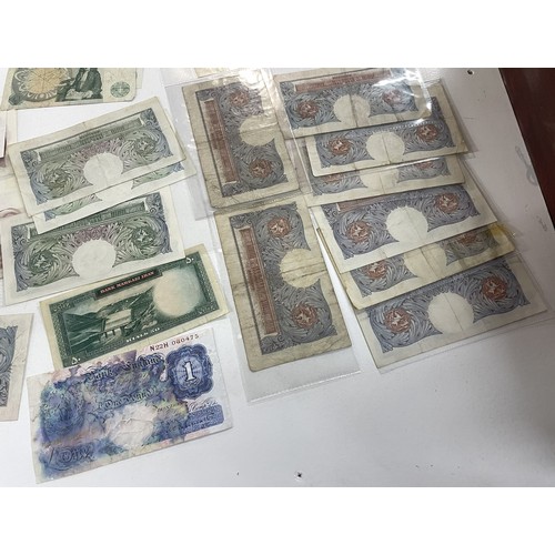 13A - A large collection of mainly British bank notes to include 10 Shilling notes, £1 Pound notes and £5 ... 