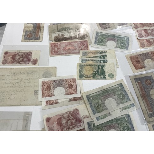 13A - A large collection of mainly British bank notes to include 10 Shilling notes, £1 Pound notes and £5 ... 