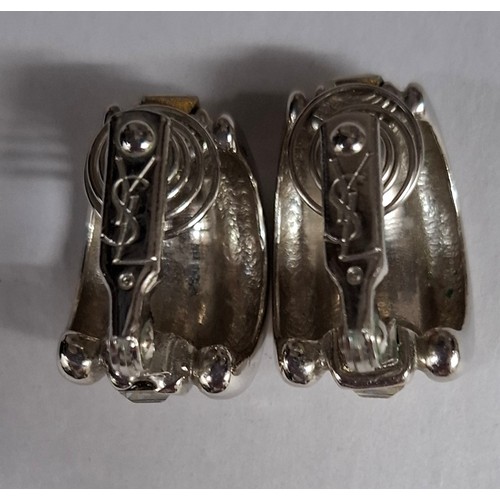 16 - YSL- A pair of late 20th Century YSL silver tone and white crystal clip on hoop earrings, made in Fr... 