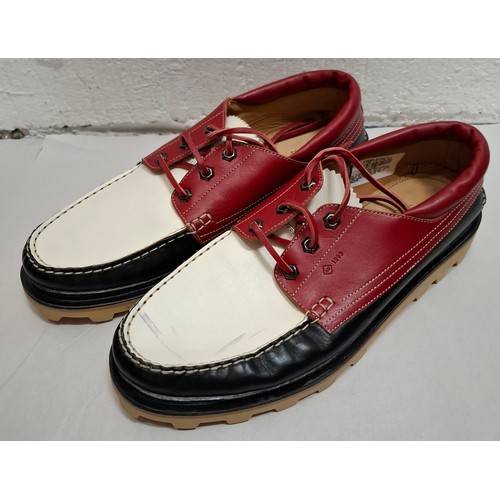 26 - Dunhill- Three pairs of gents shoes, European size 44, comprising a pair of boat shoes in navy, red ... 
