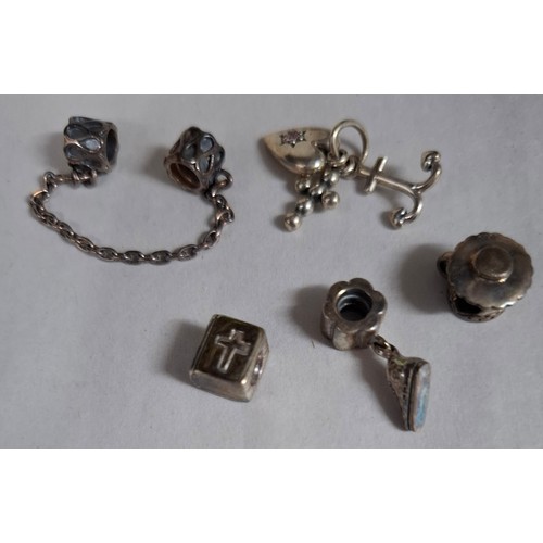24 - Pandora- A silver charm bracelet with heart clasp with inset white crystals stamped S925 to the insi... 