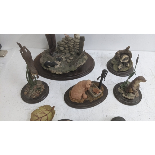23 - A collection of animal models to include a country artists 'Pause for thought' A/F, 'Pig with water ... 