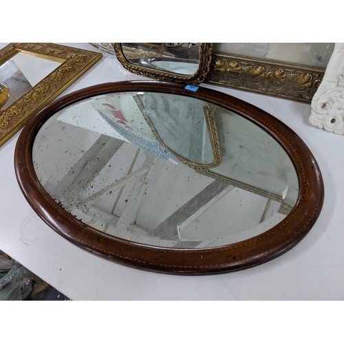 30 - Six mirrors to include a circular round mosaic style example, examples in a gilt frame and an inlaid... 