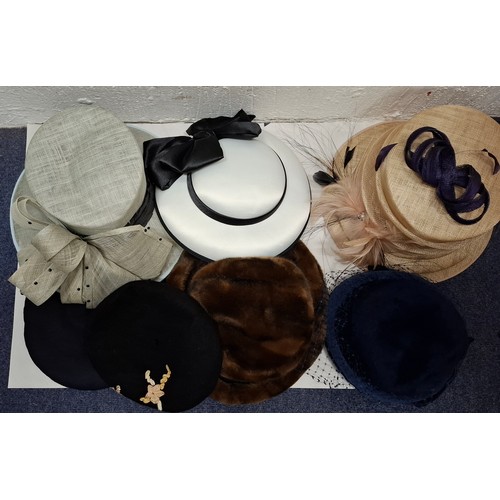 236 - A group of vintage hats to include an Emma B beige straw formal hat and a 1960's/70's Simpson gents ... 