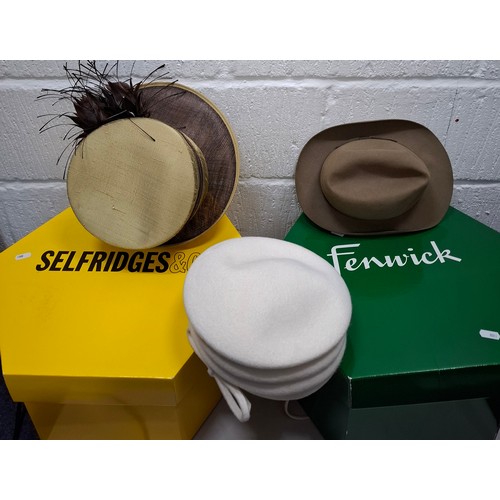 236 - A group of vintage hats to include an Emma B beige straw formal hat and a 1960's/70's Simpson gents ... 