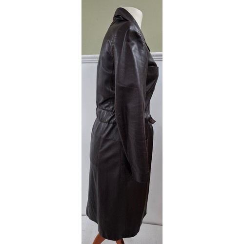 4 - Chanel- An Autumn 2001 ladies brown lambs leather fitted trench coat having a gathered waistband wit... 