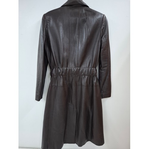 4 - Chanel- An Autumn 2001 ladies brown lambs leather fitted trench coat having a gathered waistband wit... 