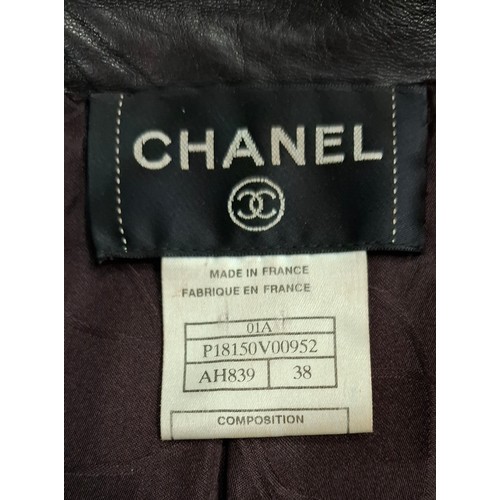 4 - Chanel- An Autumn 2001 ladies brown lambs leather fitted trench coat having a gathered waistband wit... 