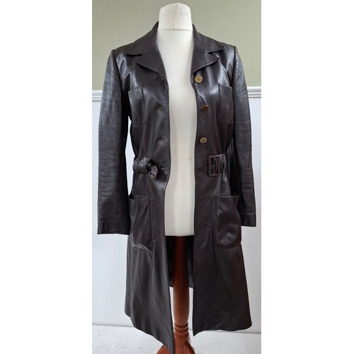 4 - Chanel- An Autumn 2001 ladies brown lambs leather fitted trench coat having a gathered waistband wit... 