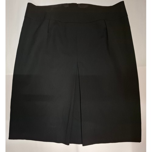 13 - Celine and MiuMiu- A Celine black wool skirt having 3 branded buttons to the front fastening, pleats... 