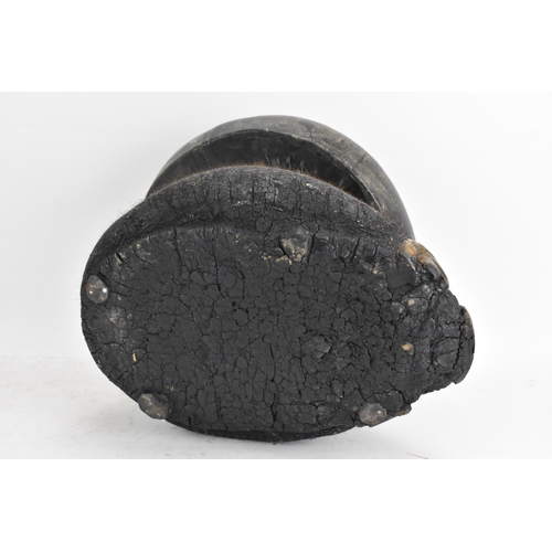 246 - Taxidermy: A late 19th/early 20th century Elephants foot fashioned into a stool, having a zebra skin... 
