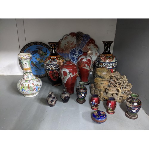 257 - A selection of oriental items to include a Chinese cloisonne charger decorated with birds on blossom... 