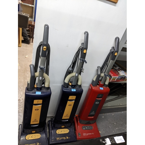 264 - Three upright vacuum cleaners - a SEBO automatic X1.1; and two SEBO automatic X 4 extra 1300W.
Locat... 